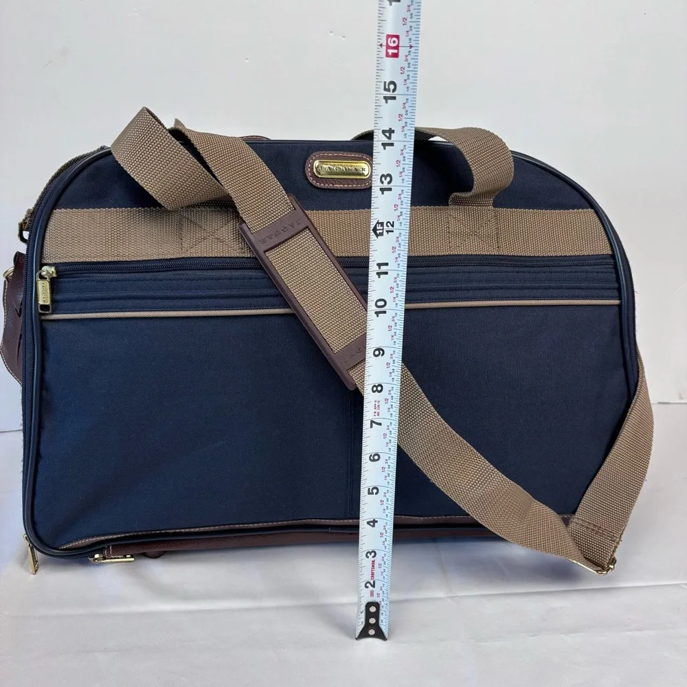 Jaguar Blue and Tan Carry On with Adjustable Strap and Structured Shape. Nice!